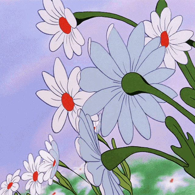 a bunch of daisies with red centers are growing in a field