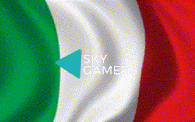 a green , white and red flag is waving in the wind