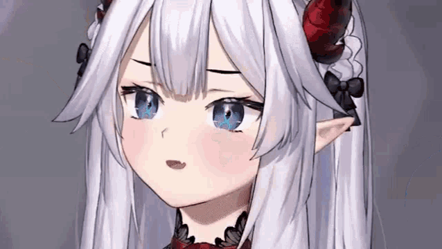 a close up of a anime girl with long white hair and horns making a funny face .
