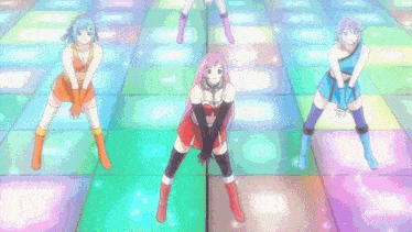a group of anime girls are dancing on a dance floor .