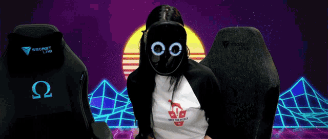 a woman wearing a mask is sitting in front of a chair that says secret lab on it