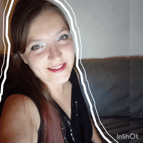 a woman is smiling with a white line around her face and the word inshot is on the bottom
