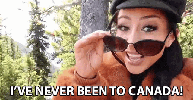 a woman wearing sunglasses and a hat says " i 've never been to canada "