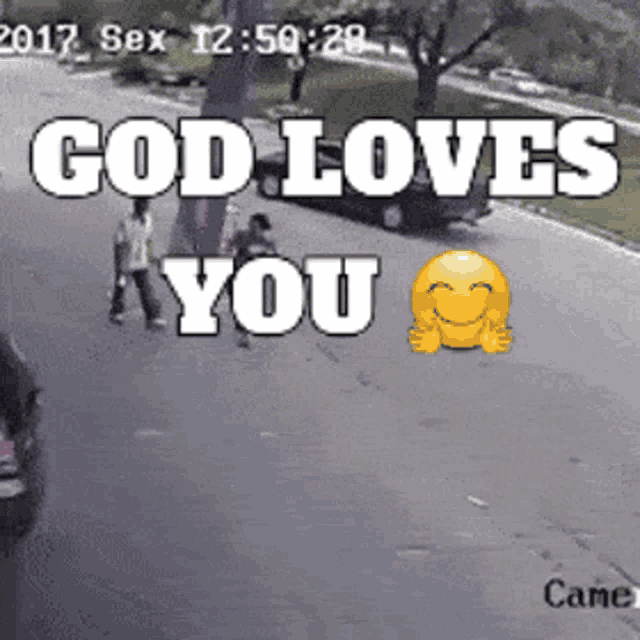 a sign that says " god loves you " with a smiley face