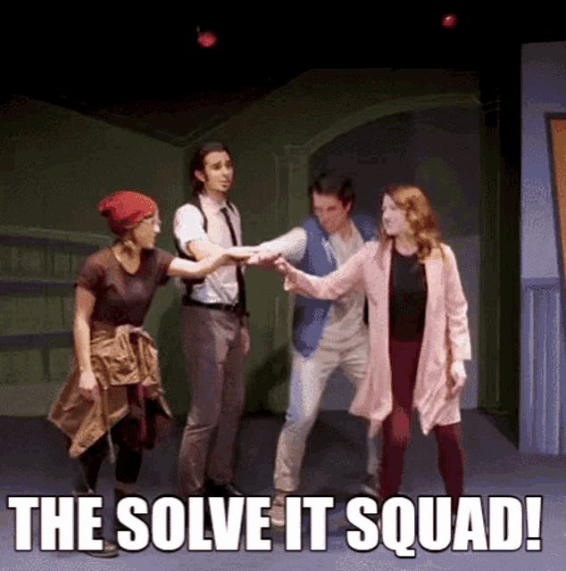 a group of people standing on a stage with the words the solve it squad written below them .