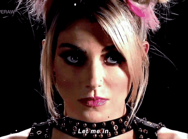 a woman wearing a choker that says let me in on it