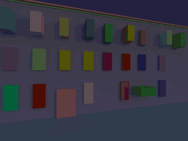a wall with a bunch of different colored blocks on it