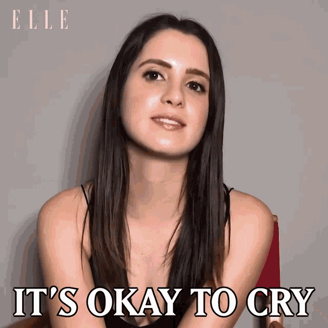 a woman says it 's okay to cry in front of a wall