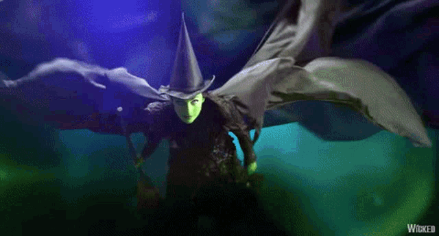 the wicked witch from the musical wicked is flying through the air