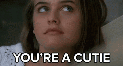 a woman is saying `` you 're a cutie '' while looking up .
