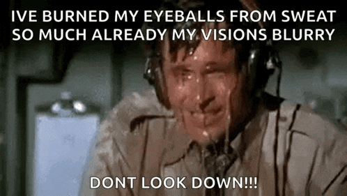 a man wearing headphones is sweating and says `` ive burned my eyeballs from sweat so much already my visions blurry ``