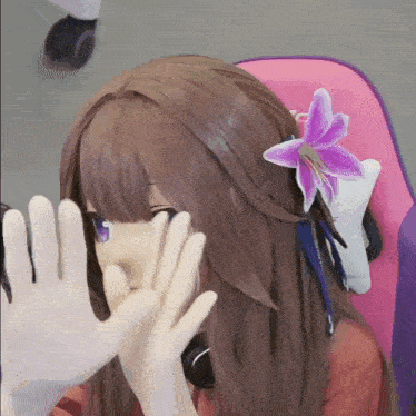 a girl with a purple flower in her hair is covering her face with her hands