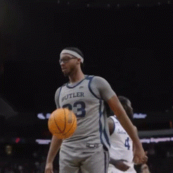 a man wearing a butler jersey with the number 23