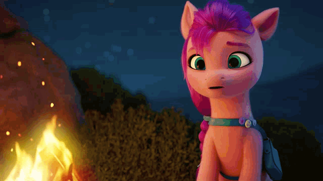 a cartoon pony with pink hair and green eyes is sitting in front of a fire