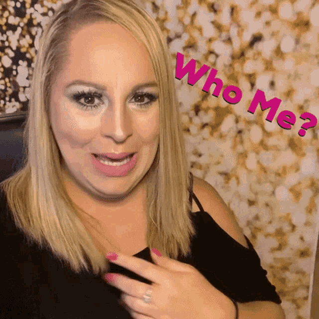 a woman with a ring on her finger says " who me "