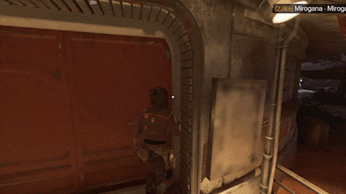 a man in a video game is running towards a door that says open on it