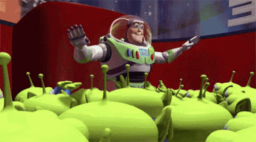 buzz lightyear is surrounded by green aliens from toy story .