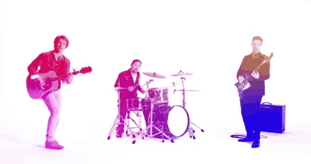a man playing a guitar next to a man playing drums and another man playing a guitar