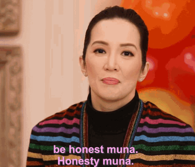 a woman wearing a striped sweater says be honest muna honesty muna