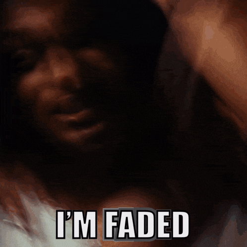 a dark background with the words i 'm faded in white letters