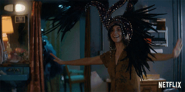 a woman wearing a feathered headdress with netflix written on the bottom right