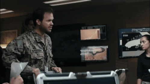 Throwing A Paper Airplane Seal Team GIF - Throwing A Paper Airplane Seal Team Jason Hayes GIFs