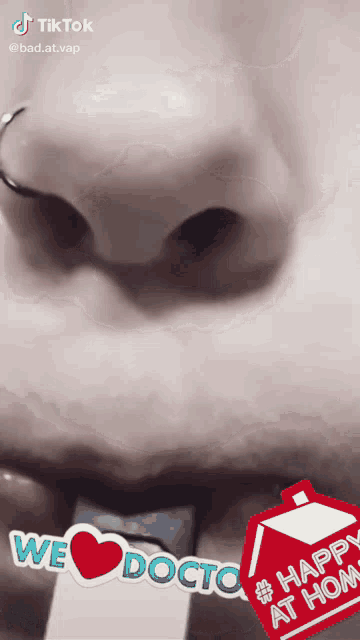 a close up of a person 's nose with a sticker that says we docto