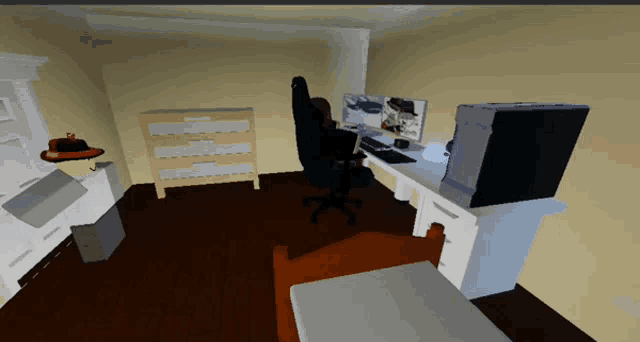 a computer screen shows a person sitting at a desk with a computer on it