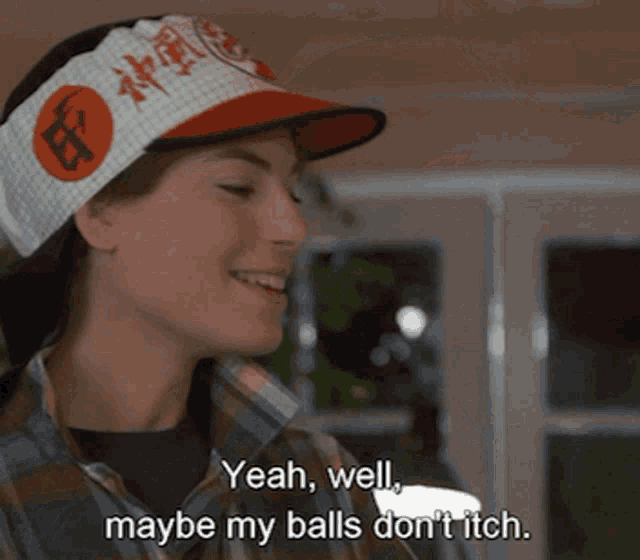 a woman wearing a headband that says yeah well maybe my balls don t itch
