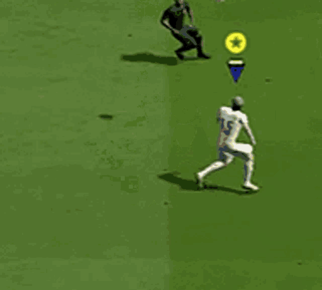 two soccer players are playing a game and one of them is fouled