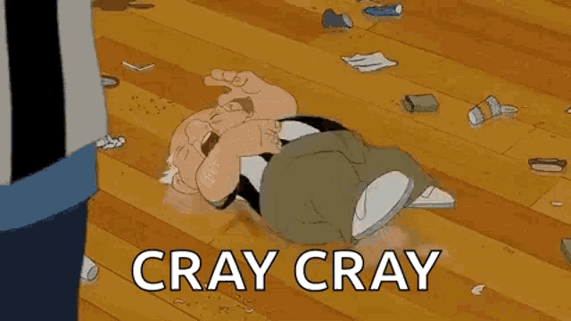 a cartoon of a man laying on the floor with the words `` cray cray '' written on it .