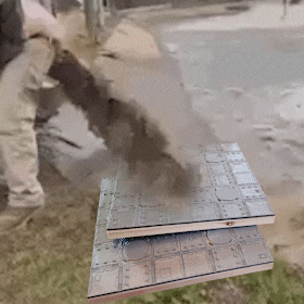 two pieces of metal are stacked on top of one another
