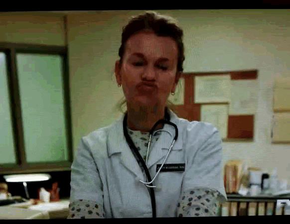 a female doctor with a stethoscope around her neck has a name tag that says andrews