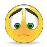 a cartoon smiley face with green eyes and a sad look on its face .