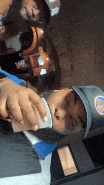 a man wearing a hat that says ny on it