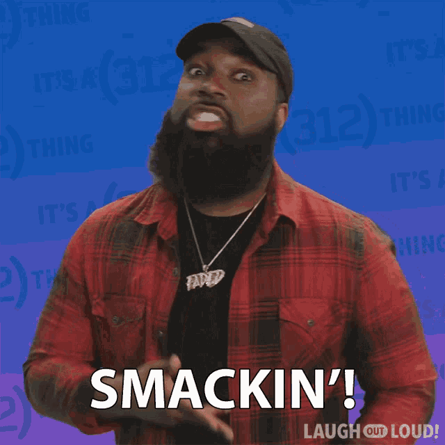 a man in a plaid shirt says smacking
