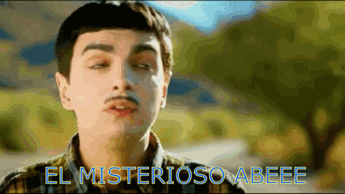 a man with a mustache and the words el misterioso abeee above him