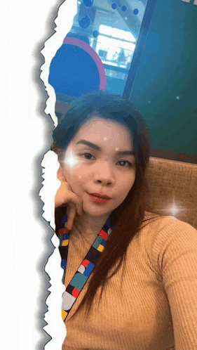 a woman is taking a picture of herself with a torn paper border