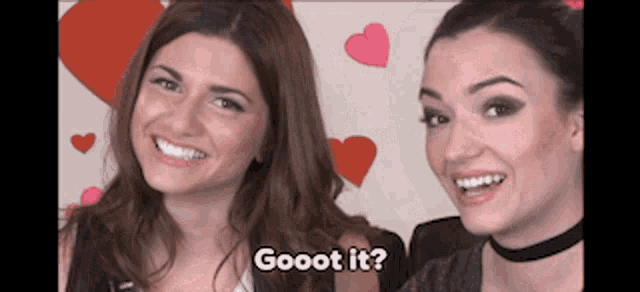 two women are smiling for a picture and one of them says goood it