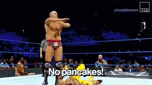 a man in a wrestling ring with the words no pancakes