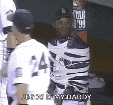 a baseball player is taped up with tape and says jegos is my daddy .