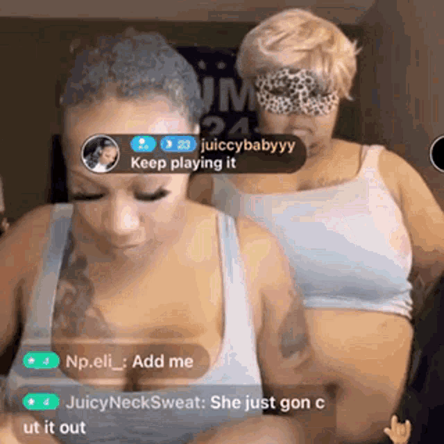 two women are standing next to each other and one of them has a mask on her eyes .