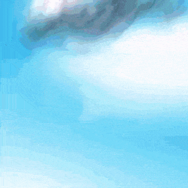 a robot is flying through the air with a blue sky in the background