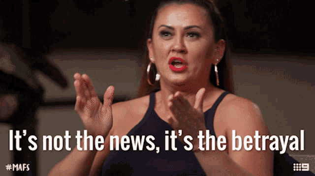 a woman says " it 's not the news it 's the betrayal " on a screen