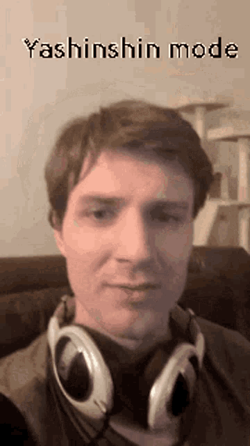 a man wearing headphones with yashinshin mode written on the bottom