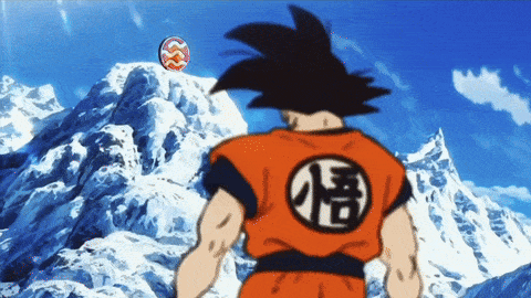 a cartoon character with a chinese symbol on his back stands in front of a snowy mountain