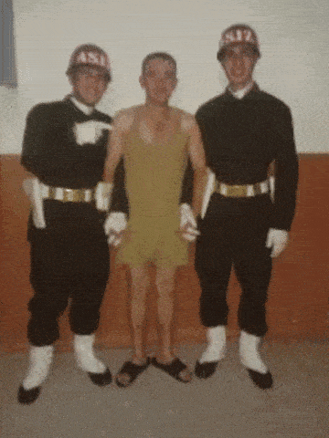 three soldiers are posing for a picture with one wearing a helmet that says asil on it