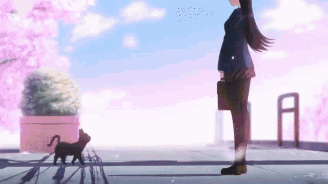 a girl and a cat are standing next to each other on a sidewalk .