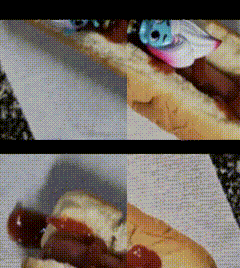 a close up of a hot dog with ketchup and mustard on a bun