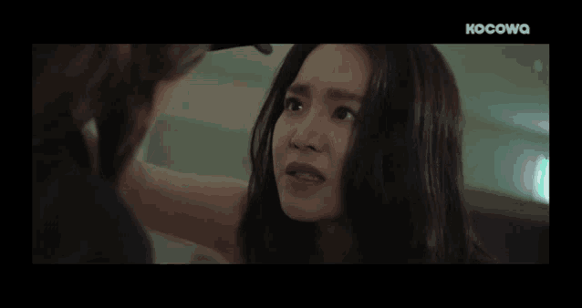 a woman is talking to another woman and asking her to stop this will you .